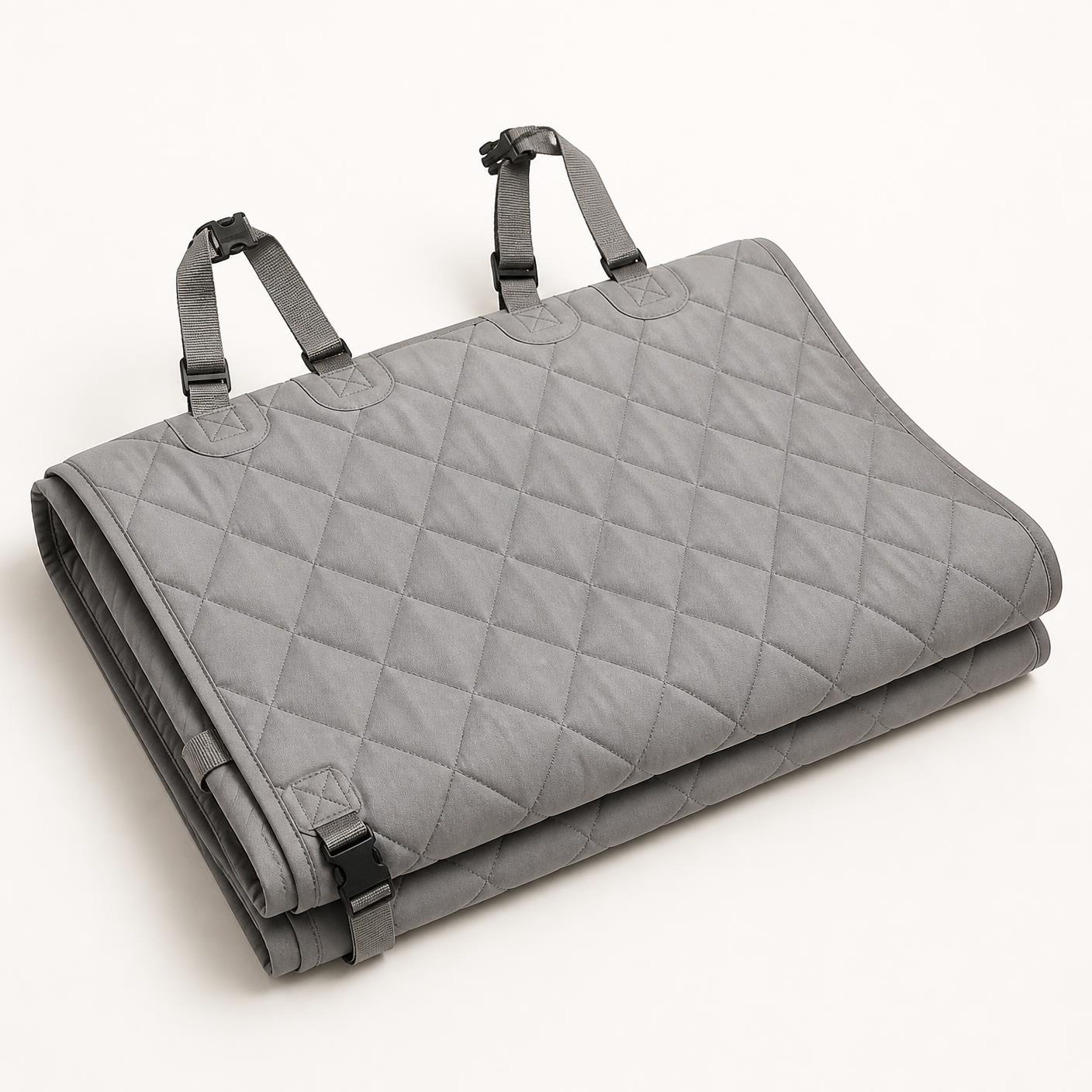 The hammock seat cover in light grey folded to show the quilting
