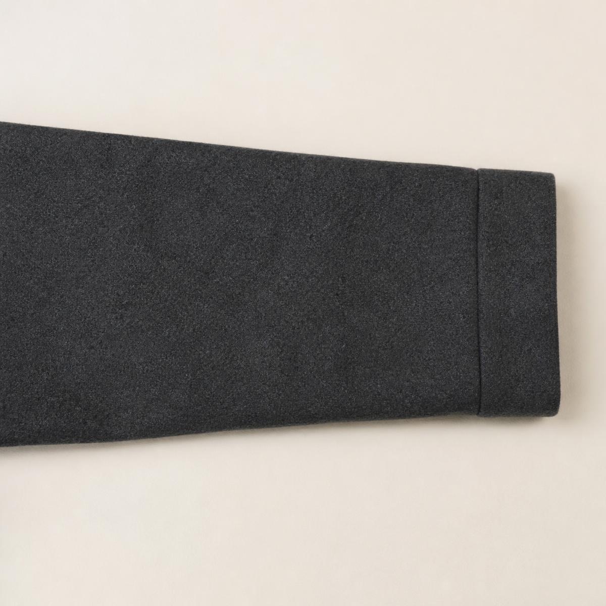 Charcoal upholstery before and after one pass with the roller — after